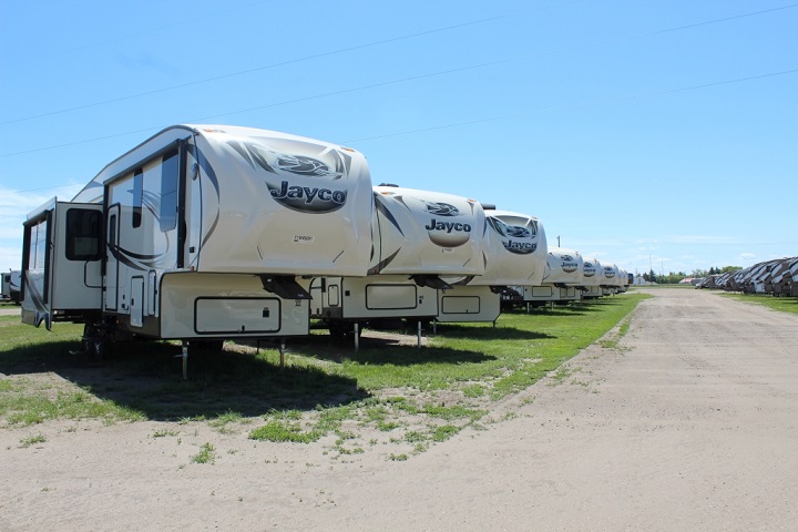 Jayco campers lined up in the lot.