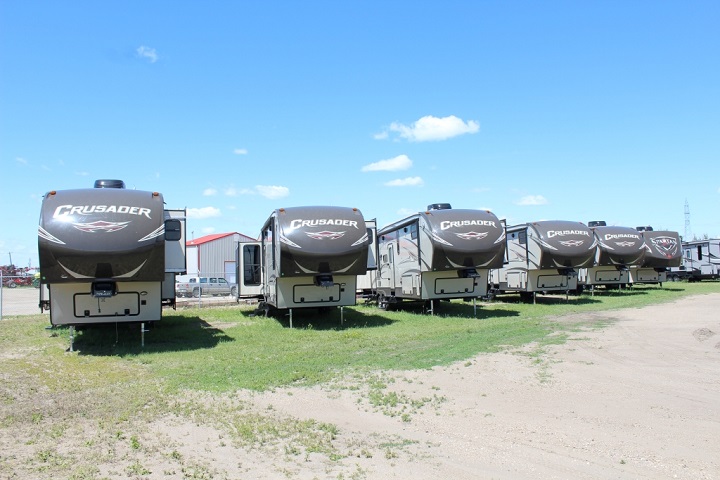 Crusader RVs parked next to each other in the lot. 